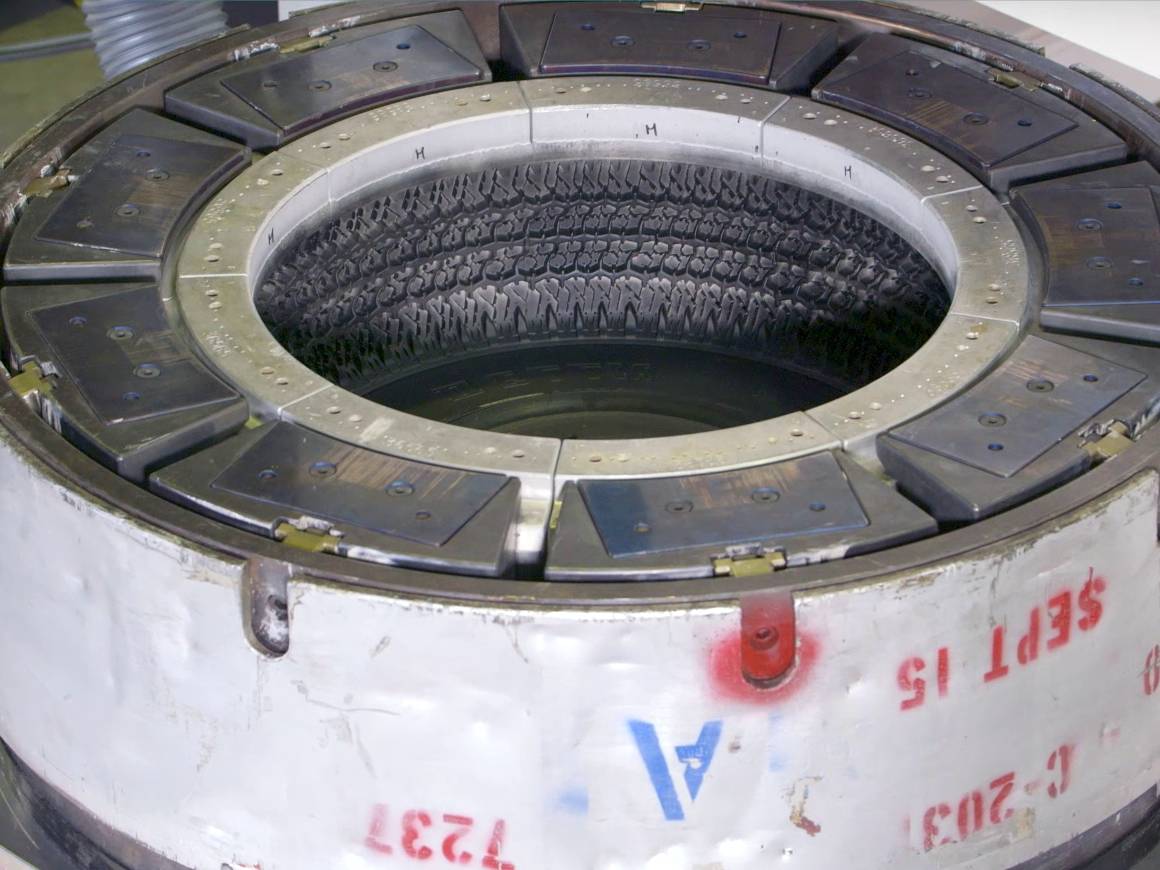Dirty tire mold - production residues and release agents have to be removed Dirty tire mold - production residues and release agents have to be removed