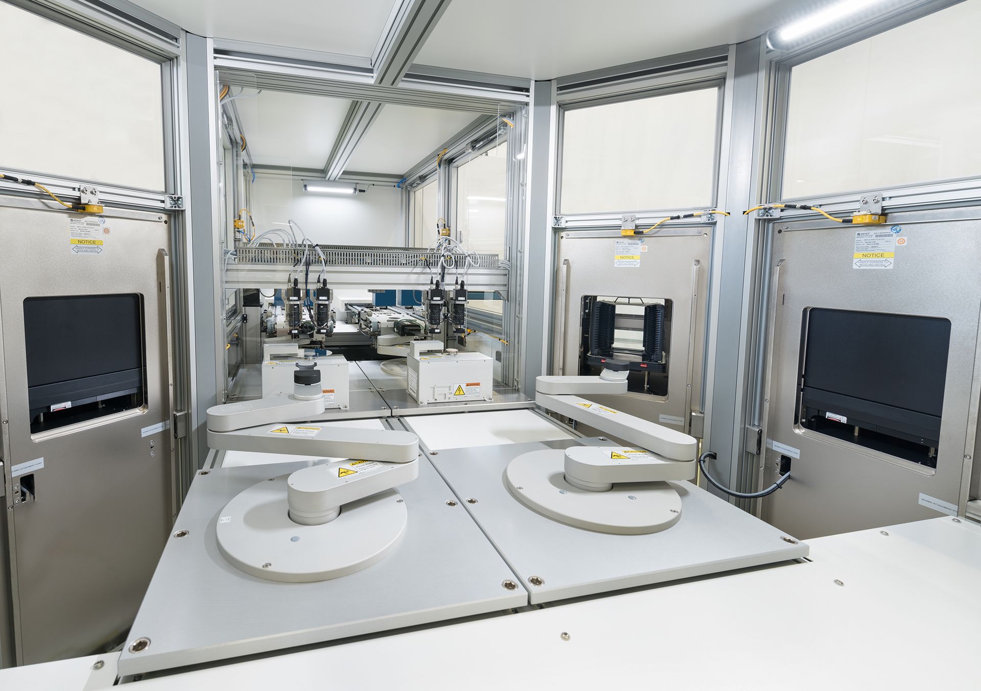 Interior view of an integrated glass processing machine.