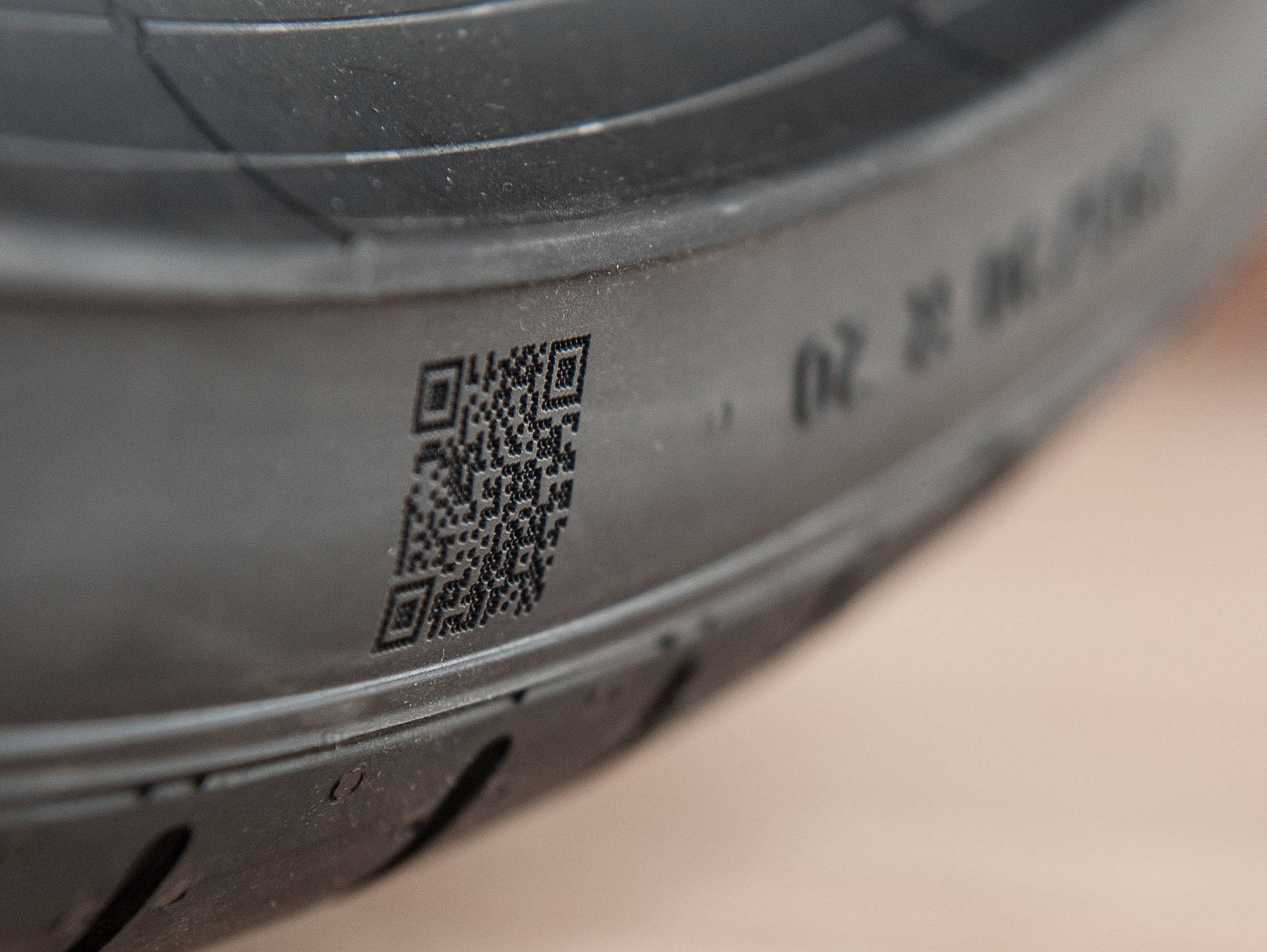 Laser engraved QR code on a tire sidewall Laser engraved QR code on a tire sidewall
