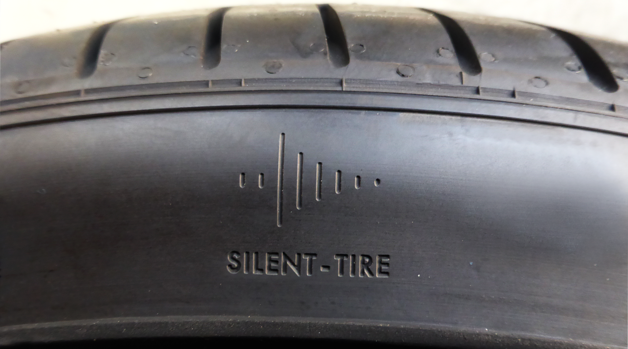 A laser engraved logo identifies the tire as a Silent Tire