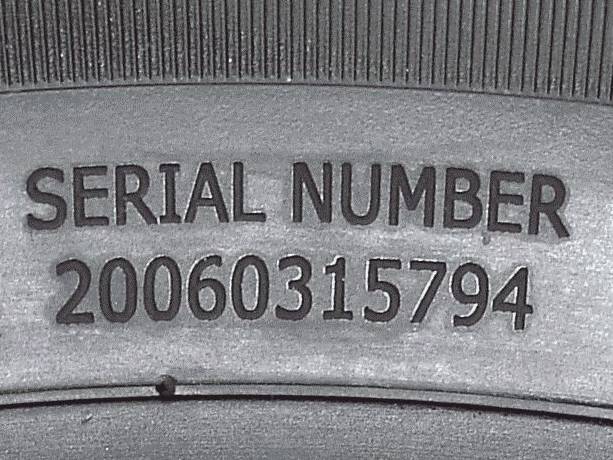 Alphanumeric engraving on a tire sidewall Alphanumeric engraving on a tire sidewall