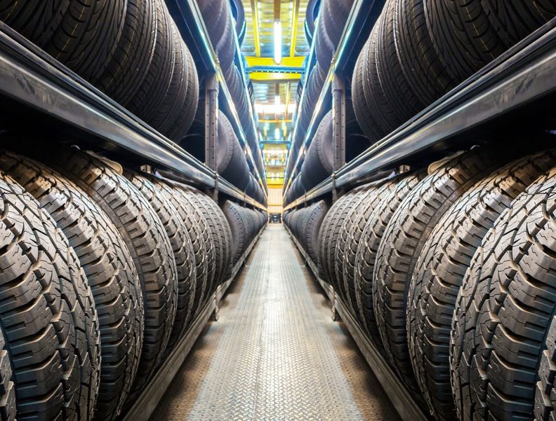 Photo of a full tire warehouse.