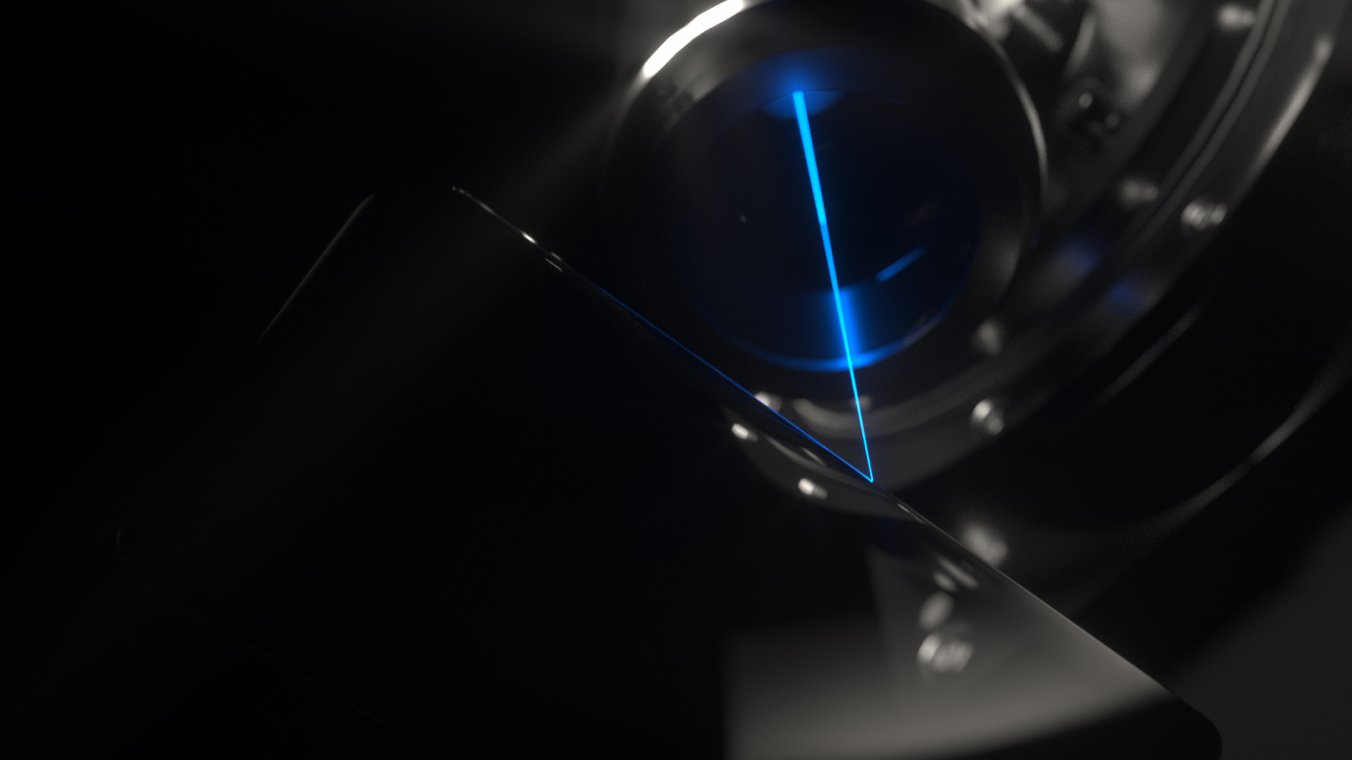 Eine Glaskeramik wird mittels Laserstrahl geschnitten. Der Laserstrahl ist hier blau dargestellt und trifft auf die Kante des geschnittenen Bauteils.