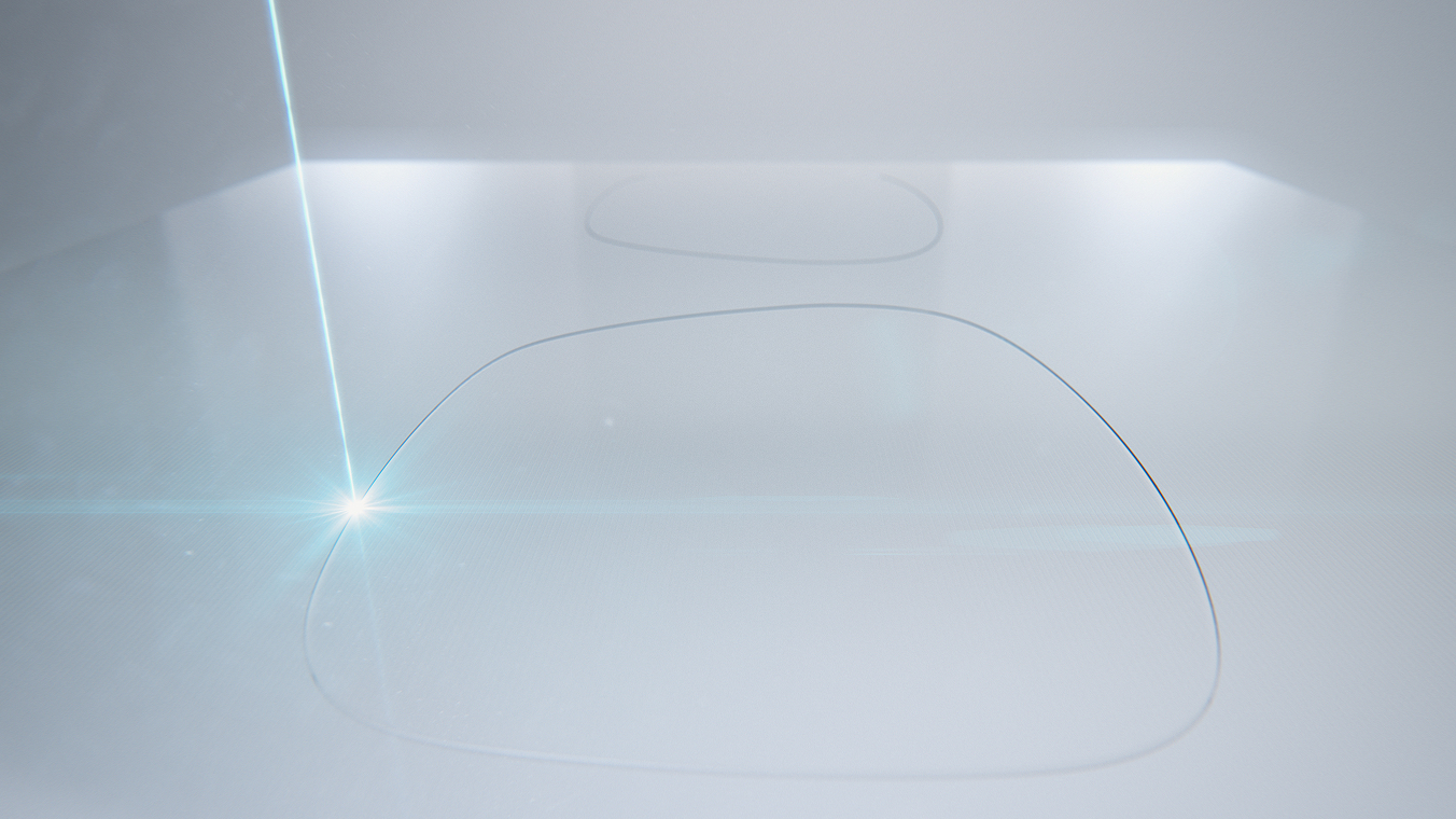 AR-Brillenglas, welches durch einen Laserstrahl aus einer größeren Glasscheibe herausgeschnitten wird. Der Laserstrahl wird schematisch dargestellt.